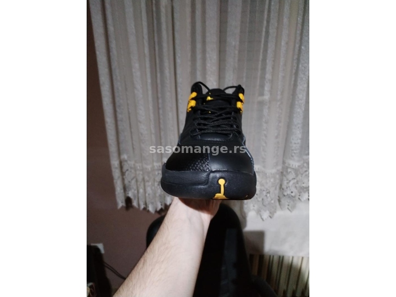 jordan 12 black taxi