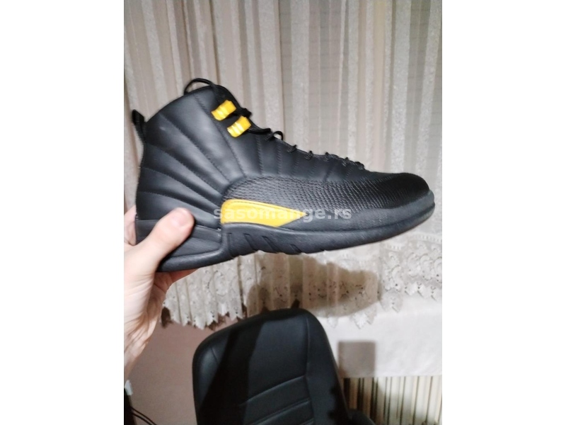 jordan 12 black taxi