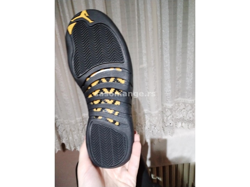 jordan 12 black taxi