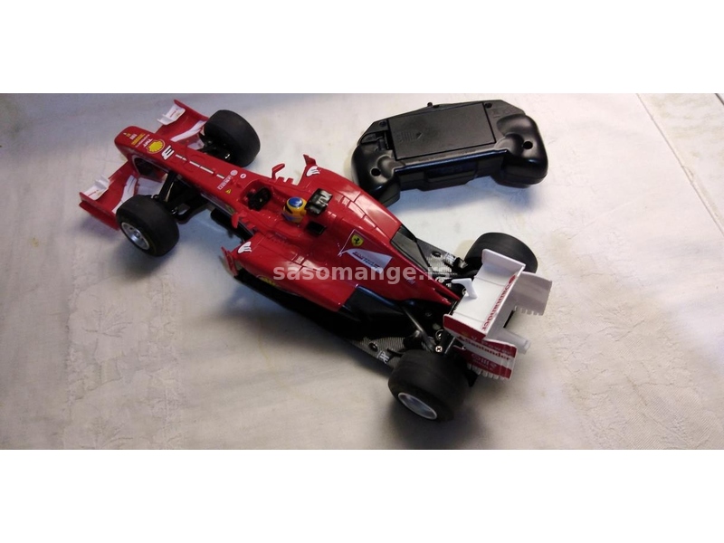 Na daljinski Rastar Ferrari F1 razmera 1:18, 2,4 GHz sa daljinskim i baterijama,ispravan